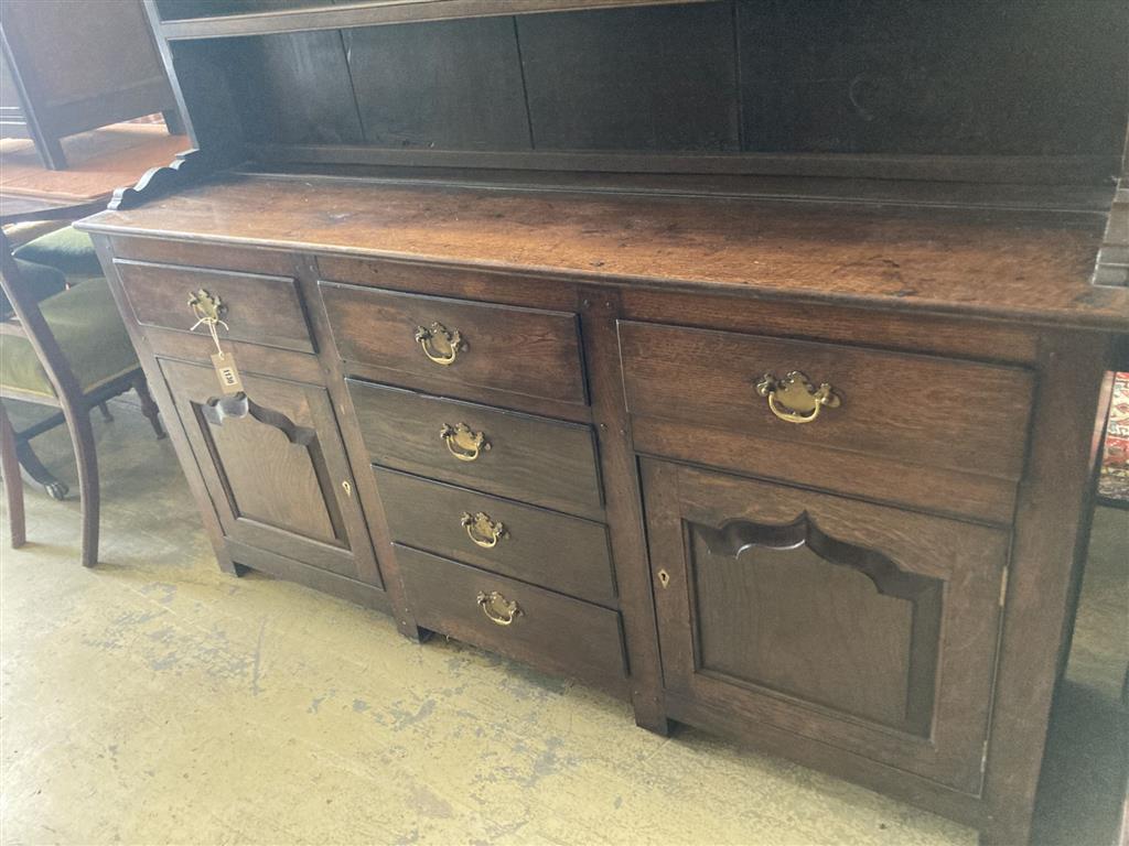 A mid 18th century oak dresser, length 154cm, depth 39cm, height 190cm